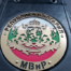Метален знак на МВнР в кожен калъф
